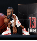 James Harden collectible figurine in a Houston Rockets white jersey.